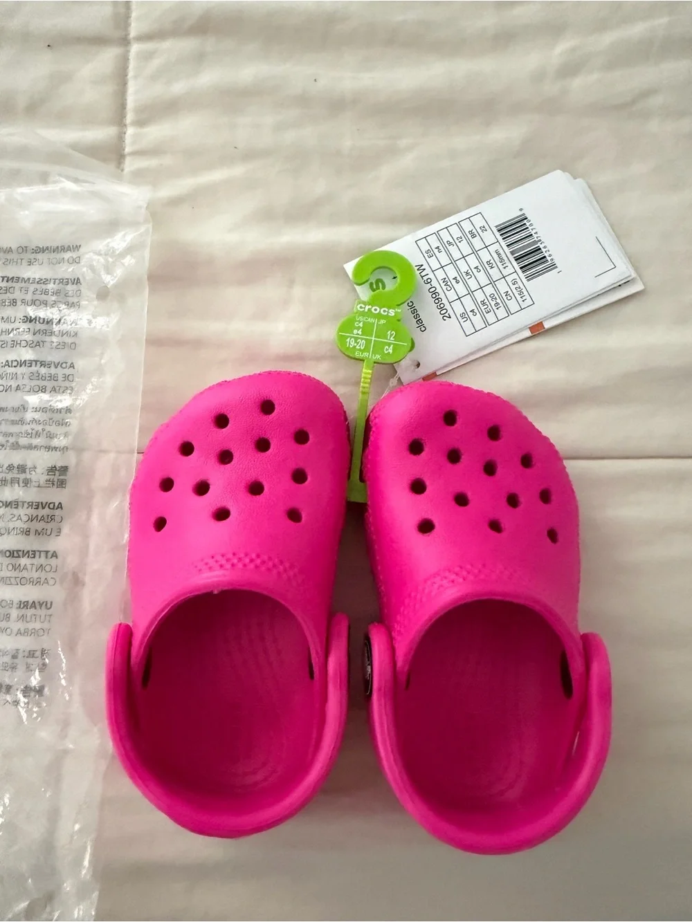 CROCS Kids' Classic Clog in Bright Pink